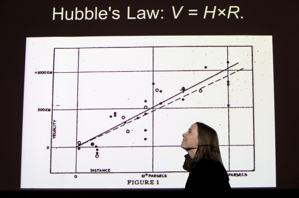 Students from the 'Tyneside STEM Scholar Programme', who are part of the 'Reece Foundation' programme visit the 'Centre For Life'....Louise McIntyre at the Hubble workshop with a graph of 'Hubble's Law'