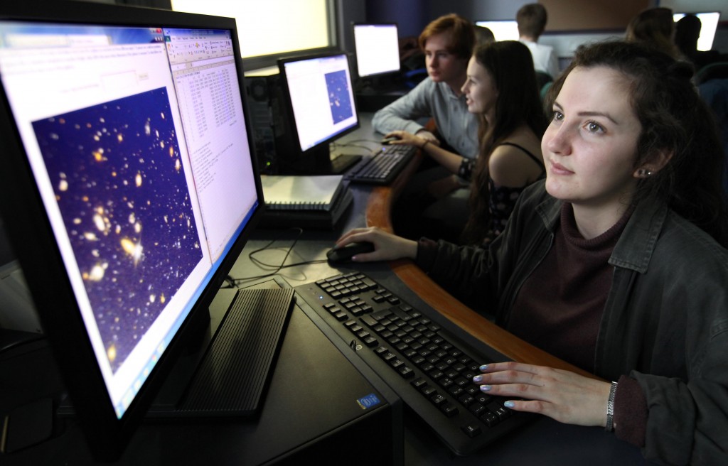 Students from the 'Tyneside STEM Scholar Programme', who are part of the 'Reece Foundation' programme visit the 'Centre For Life'...Emma Ross in the 'Hubble' workshop looking at Hubble Deep Field images