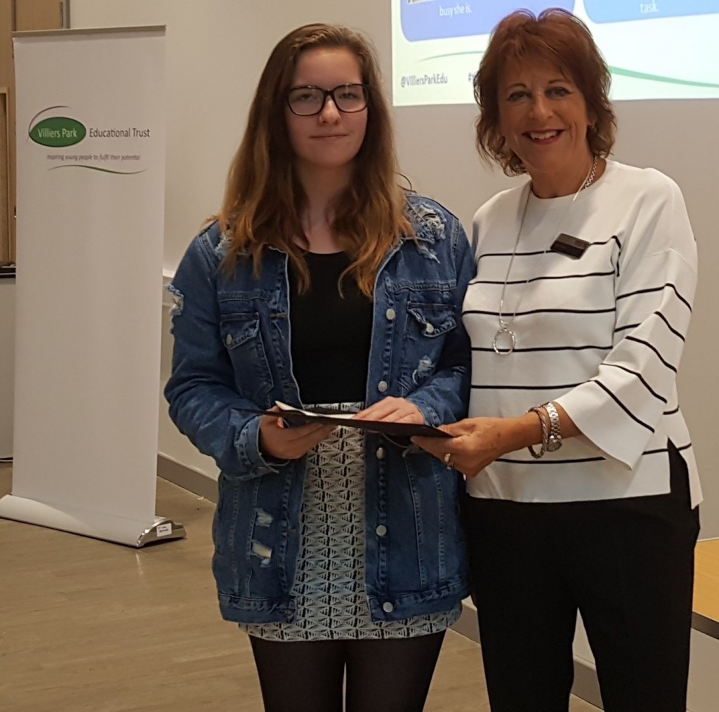 Mike Baker Year 12 Scholar of the Year, Rebecca Cather of Excelsior Academy, receives her award from Anne Reece, chair of the Reece Foundation